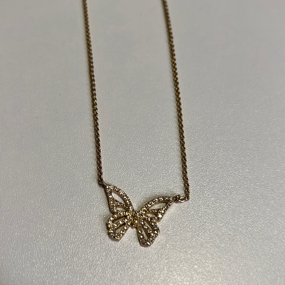 Kate Spade Gold butterfly necklace with small crystals